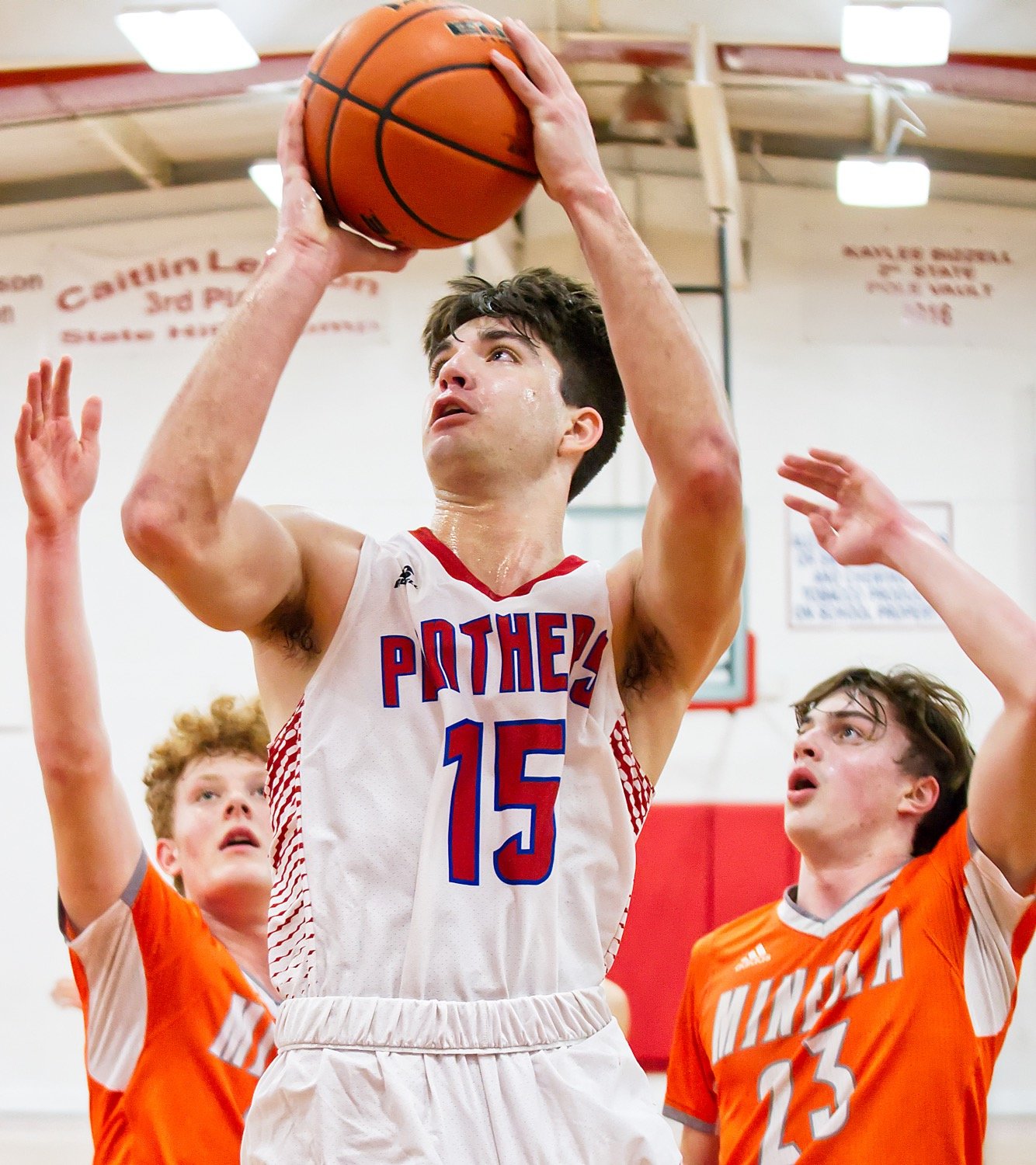 Panther forward Tim Mitchell puts up a shot late in action Friday at home against Mineola.